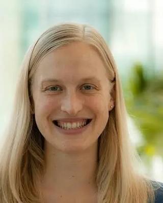 headshot of blonde woman smiling